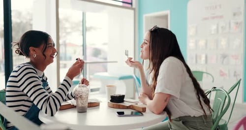 Friends, women in cafe and eating cake, social get together and talking