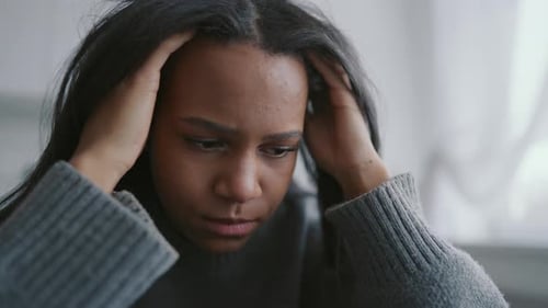 Vertical Portrait of Young African Woman Feeling Headache Exhausted Freelancer at Home Office Worker