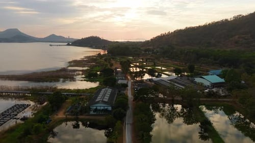 Aerial View of Rural Fish Farm at Sunset