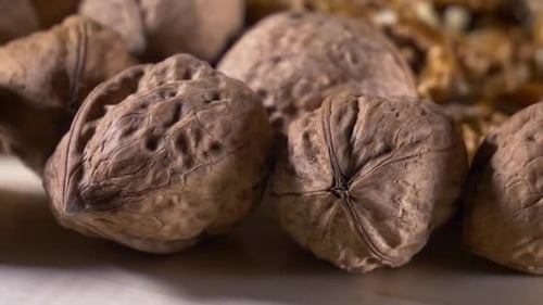 Walnuts On Wooden Plate
