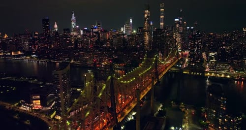 Ed Koch Queensboro Bridge with splendid backlight at night. Stunning panorama of New York City