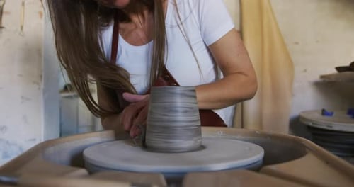 Creative Woman Working in Shop Making Pottery. Small Shop Owner Adults
