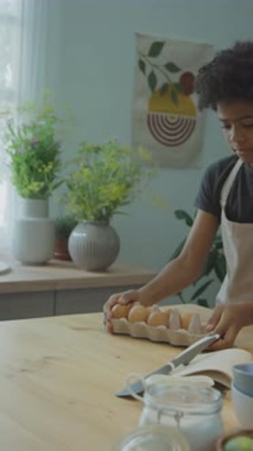 Young Adult Prepares Ingredients for Baking at Home