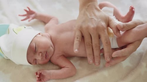 Adorable Newborn Baby with Smiling Face Top View Relaxing Time Doing Belly