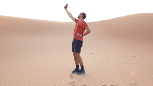 Lost Man Searching Signal with Cellphone on Desert, Super 240