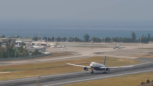 Passenger Plane Takes Off From Tropical Airport