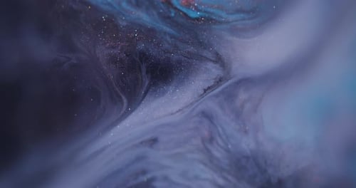 Abstract Colorful Swirls of Paint and Glittering Particles