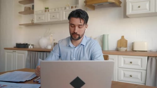 Young Adult on Video Call in Bright Kitchen