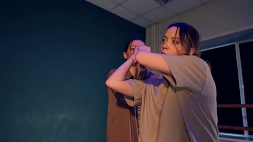 Dance Instructors Dancing in a Studio