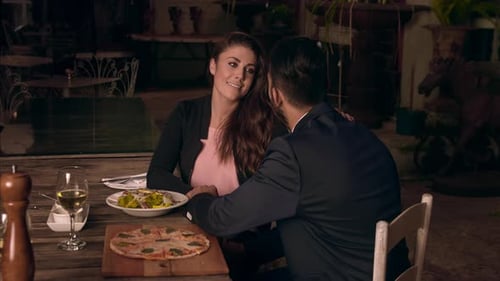 Adult Multi Ethnic Dating Couple Having a 5 Star Romantic Dinner