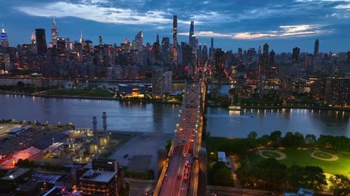 Stunning cityscape of New York in the lights. Spectacular Queensboro Bridge over East River