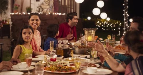 Family Celebrates Festive Occasion with Evening Meal