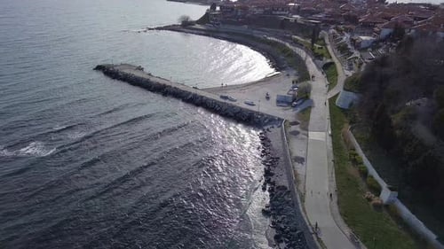 Aerial View of the City of Nessebar with Parks and Houses Built Up Streets with People Walking in