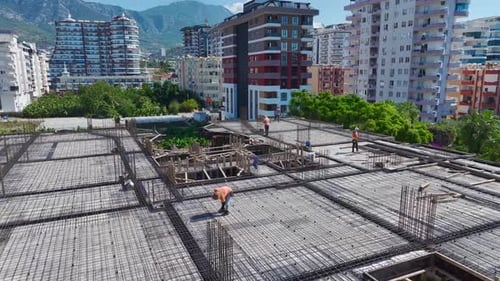 The Construction Site is Filled with Skilled Workers Showing Their Experience As They Make Progress
