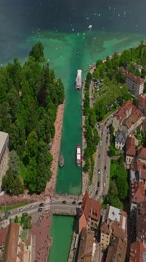 Old Town Center of Annecy and the River Thiou with Tourists Visiting Aerial View of City Building