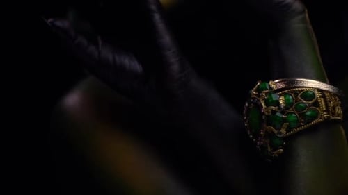 Model with Green Body Paint and Snake Hair