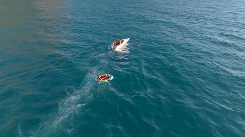 Sports Boat Sails Fast on the Sea Aerial View 4 K