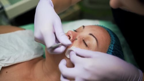 Woman Receiving a Facial Cosmetic Procedure