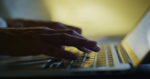 Close up shot of an young business woman's hands busy working on laptop or computer keyboard for s
