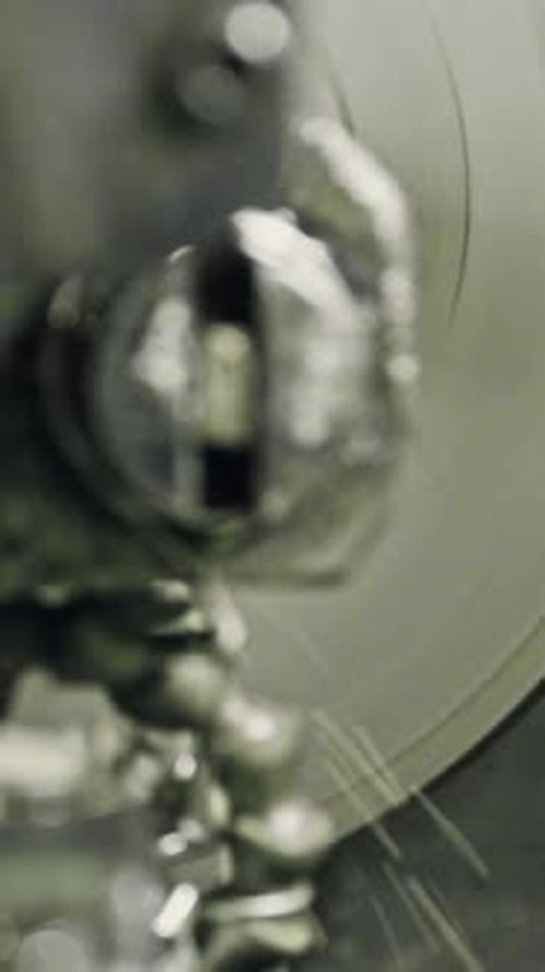 Metal grinding process in action: industrial cutting machine at work