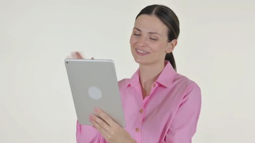 Woman uses Tablet for Video Call Indoors