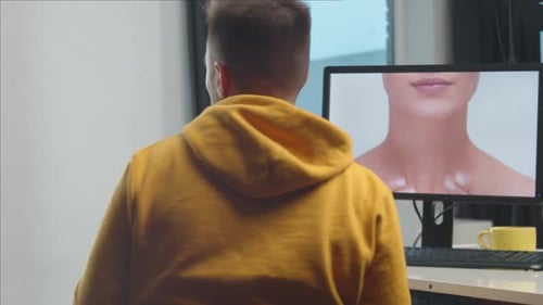 Freelance Videographer Colorist Editing Footage Using Professional Software Monitor and Montage