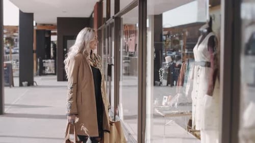 Young Woman Window Shopping Outside Sunny Storefront 2529 Years