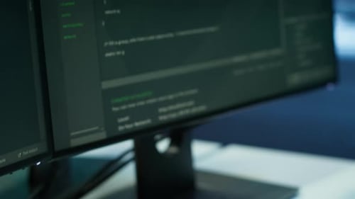 Extreme Close Up Shot of Computer Displays on Desk in Server Farm