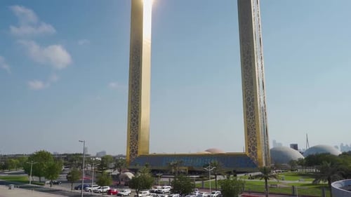 Cars Parked Near Dubai Frame In Zabeel Park At Daytime During Pandemic In Dubai, UAE. - tilt up