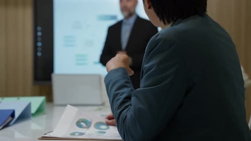 Business People in a Workplace Presentation