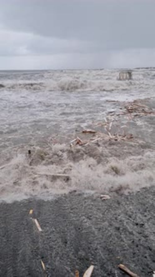 Large Foamy Waves are Hitting Shore City Beach and Embankment Affected By Hurricane Day Before