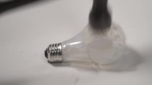 Light bulb smashed by hammer