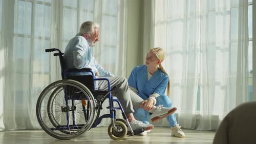 Help Support Retirement Healthcare Nurse Helping Old Man in Wheelchair Patient and Woman in Nursing