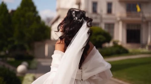 Beautiful Bride in White Dress Walking