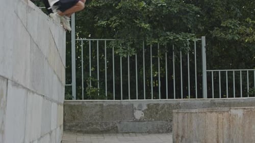 Young Woman Performing Parkour Jump in Urban Setting