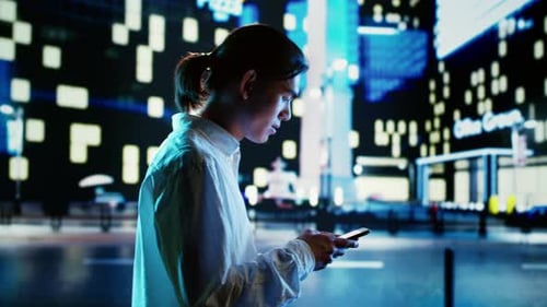 Walking Man Browsing on Smartphone