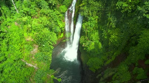 Aerial Drone View of Beautiful Aling Aling Waterfall in Nothern Bali Indonesia