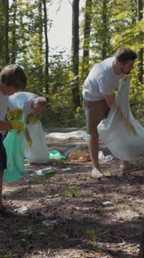 Volunteers Cleaning Up Litter in the Woods