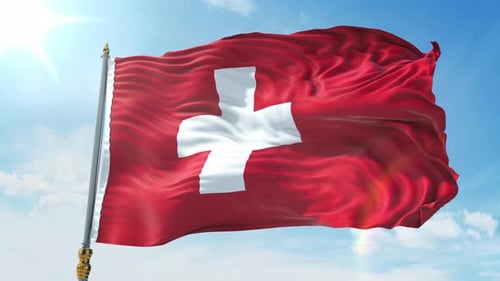 Swiss Flag Waving Proudly in Bright Sunny Sky