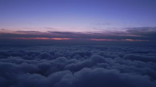 Majestic Aerial View of Clouds at Sunrise