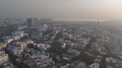 Aerial panorama of Hyderabad cityscape fading into the horizon.