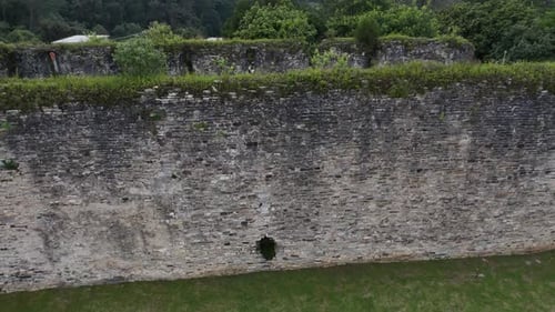 Old Historic Stone Walls with Nature Growing Through and Over