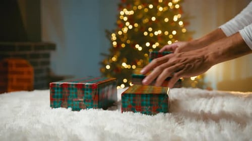 Placing Christmas Presents on a Fluffy White Rug