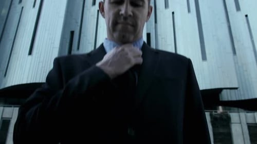 Suits Business Man Fixing His Tie Before a Deal in the City
