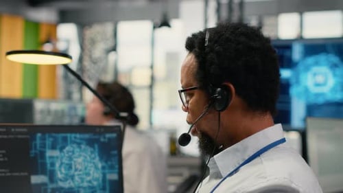 Close Up of Startup Software Developer Doing Tech Support Helping Users