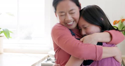 Loving Woman and Child Embracing Indoors