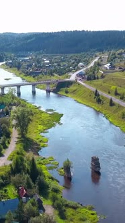 Top View of Village and Old Bridge Over River Clip Beautiful Landscape of Village on River with