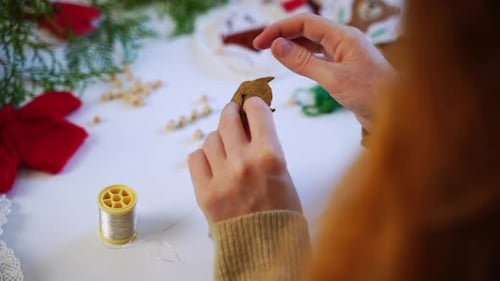 A Crafty Woman Making Christmas Soft Toys to Sell Online Shop