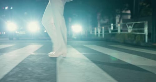 Legs, pedestrian and walking on street, night and traveller with heels, commuting