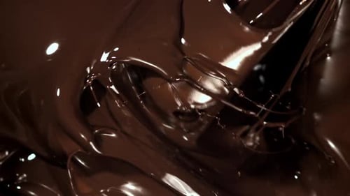 Chocolate is Stirred with a Whisk Filmed on a Highspeed Camera at 1000 Fps